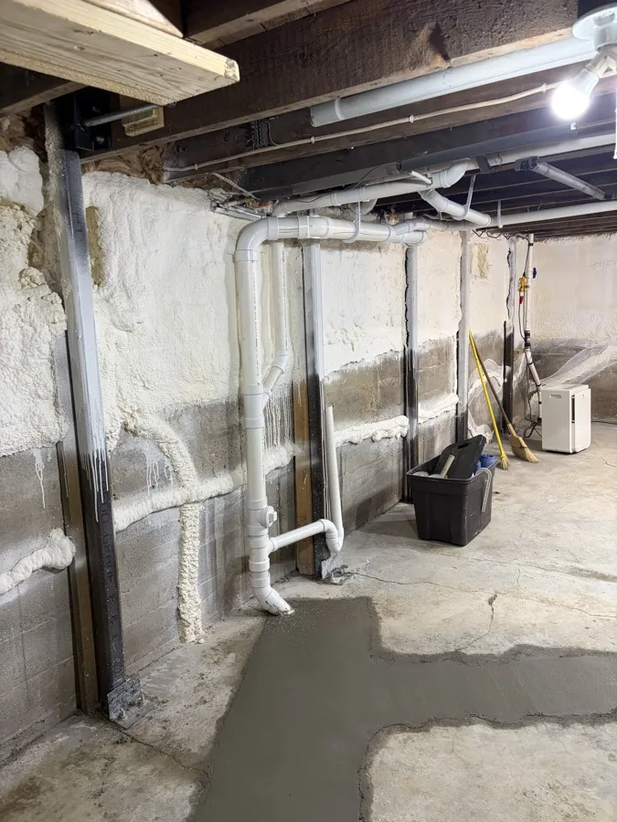 Drain and supply piping in an unfinished basement