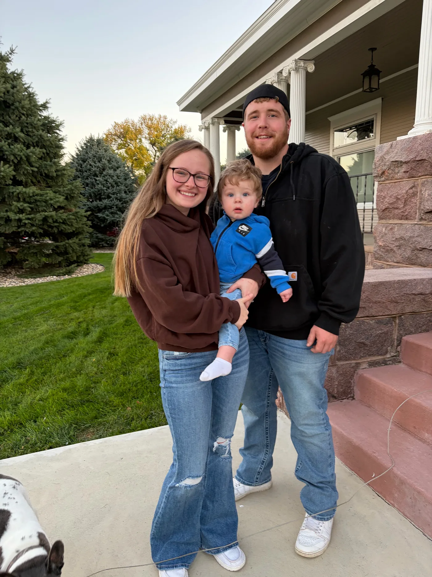 Chase and Abby outdoors together with a child