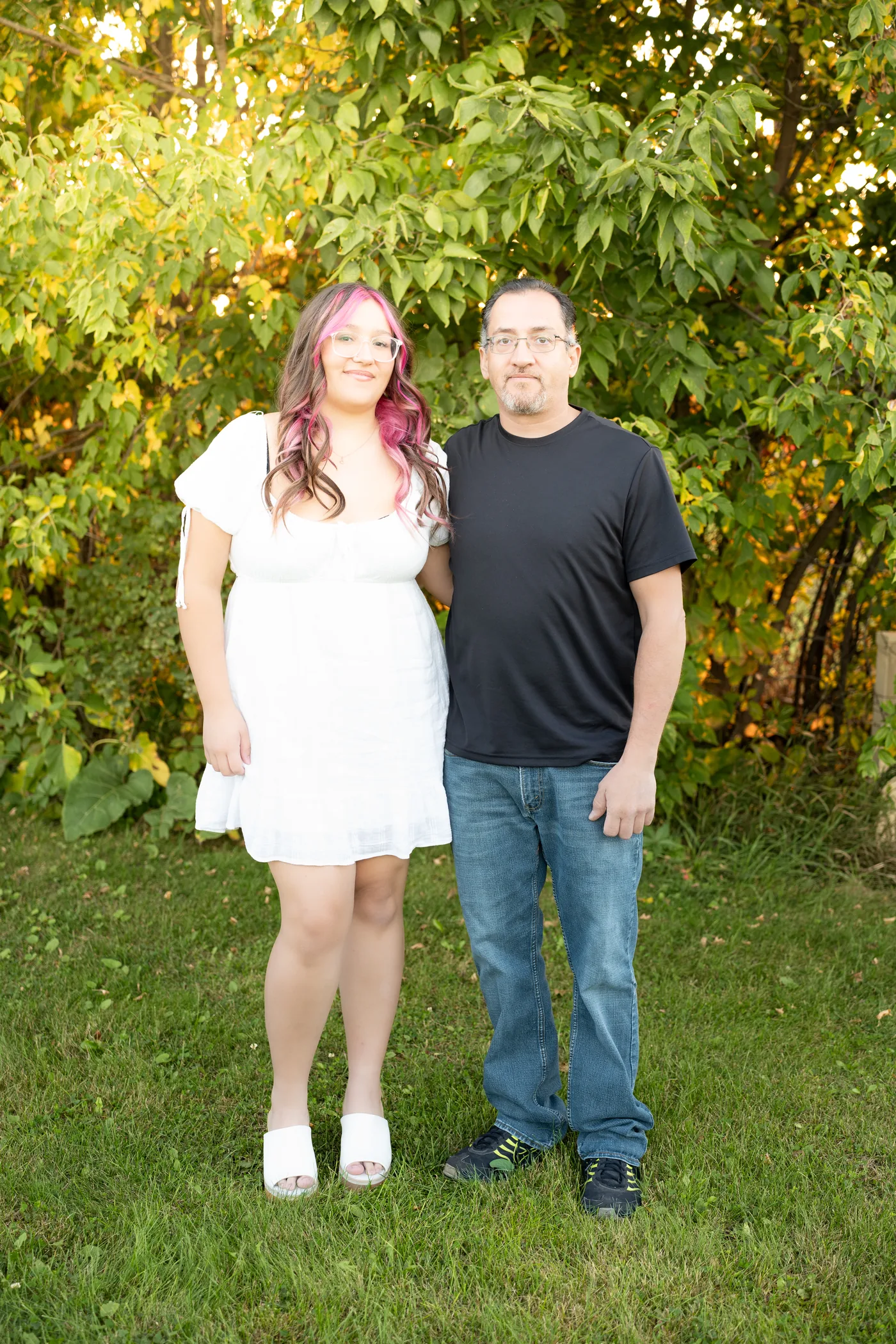 Jim standing outdoors with his daughter Izzy